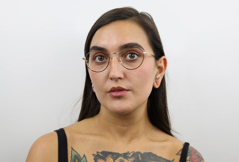 Woman wearing these luxury designer SEE Eyeglasses