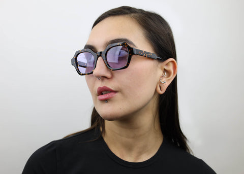 Woman wearing these SEE Eyeglasses