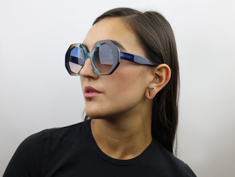 Woman wearing these luxury designer SEE Sunglasses