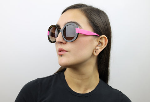 Woman wearing these luxury designer SEE Sunglasses