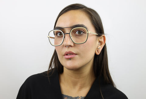 Woman wearing these luxury designer SEE Eyeglasses