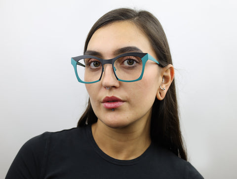 Woman wearing these luxury designer SEE Eyeglasses