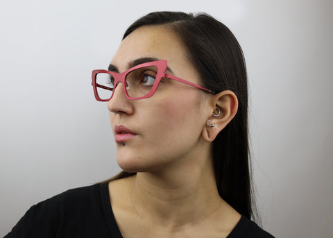 Woman wearing these luxury designer SEE Eyeglasses