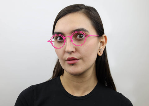 Woman wearing these SEE Eyeglasses