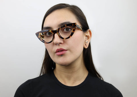 Woman wearing these SEE Eyeglasses