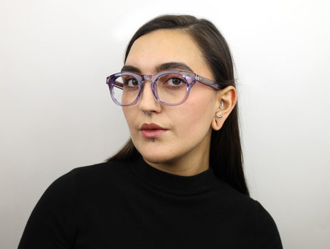 Woman wearing these luxury designer SEE Eyeglasses