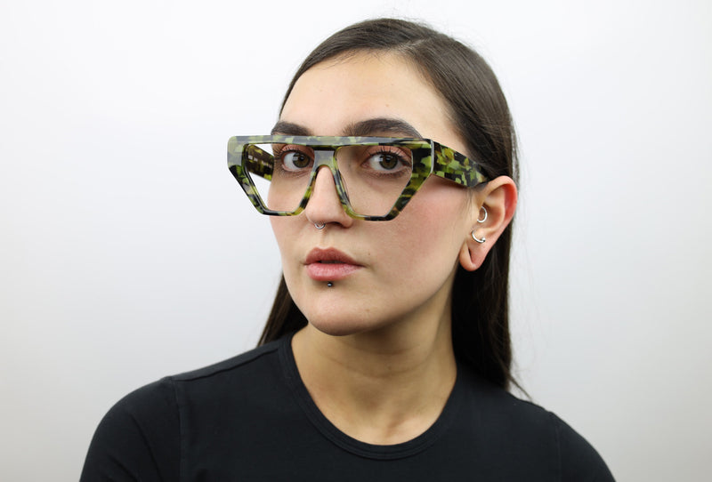 Woman wearing these luxury designer SEE Eyeglasses