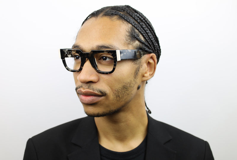 Man wearing these luxury designer SEE Eyeglasses