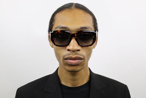 Man wearing these luxury designer SEE Eyeglasses