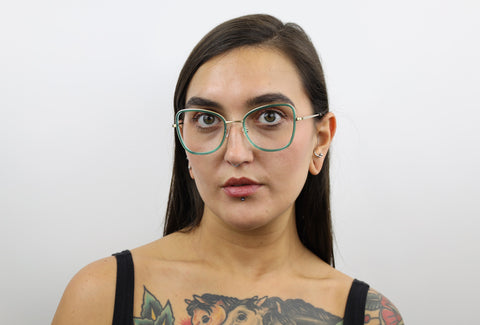 Woman wearing these luxury designer SEE Eyeglasses