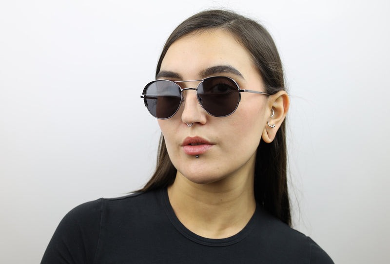 Woman wearing these luxury designer SEE Sunglasses