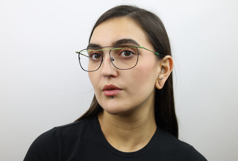 Woman wearing these luxury designer SEE Eyeglasses