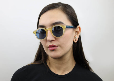 Woman wearing these SEE Eyeglasses