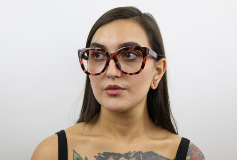 Woman wearing these luxury designer SEE Eyeglasses