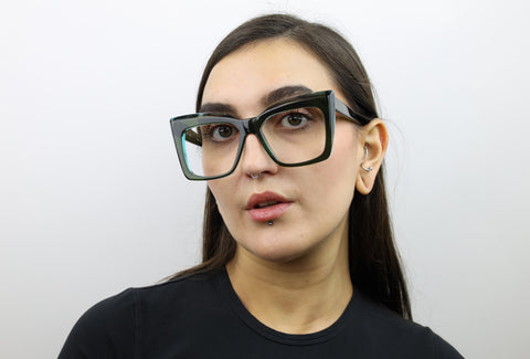 Woman wearing these luxury designer SEE Eyeglasses