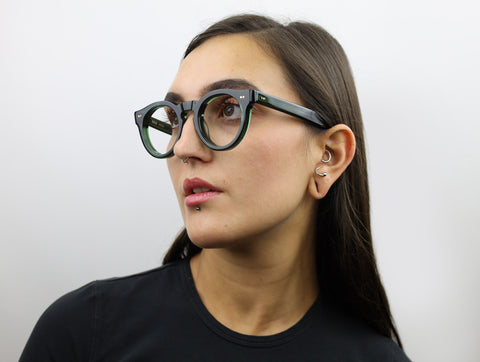 Woman wearing these luxury designer SEE Eyeglasses