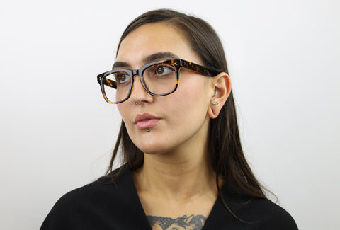 Woman wearing these luxury designer SEE Eyeglasses