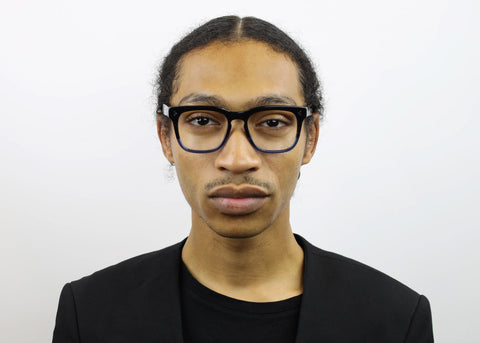 man wearing these luxury designer SEE Eyeglasses
