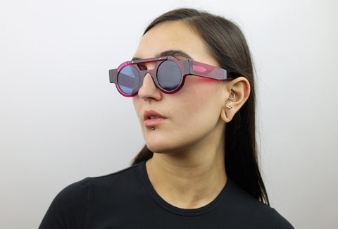 Woman wearing these luxury designer SEE Sunglasses