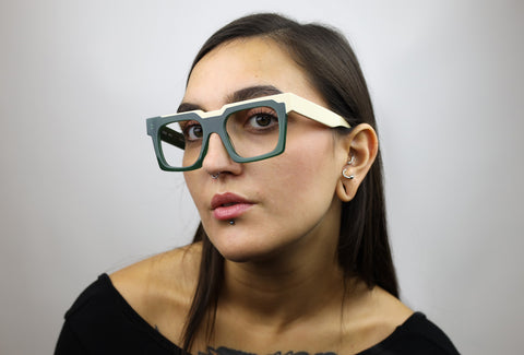 Woman wearing these luxury designer SEE Eyeglasses