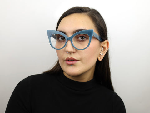 Woman wearing these luxury designer SEE cat-eye Eyeglasses