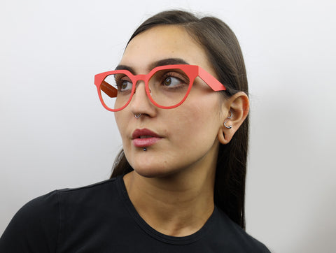 Woman wearing these luxury designer SEE Eyeglasses