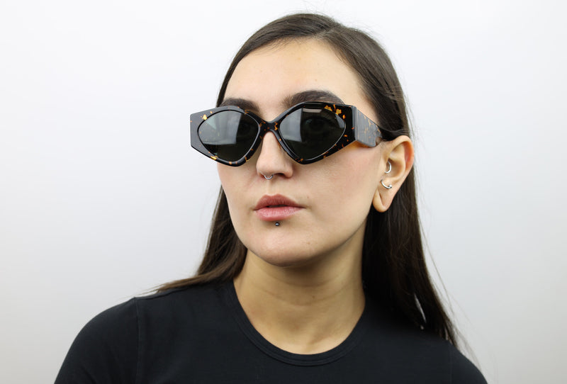 Woman wearing these luxury designer SEE Sunglasses