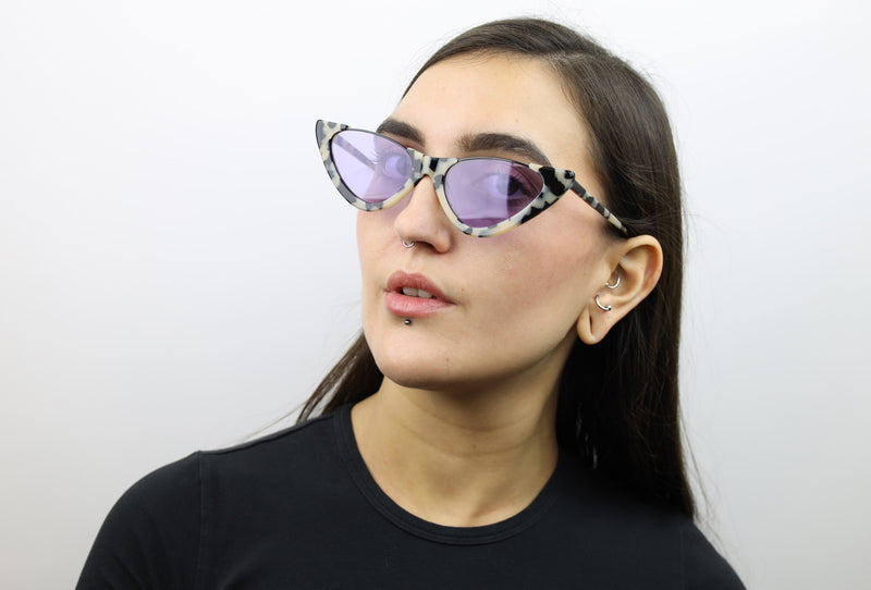 Woman wearing these luxury designer SEE cat eye sunglasses