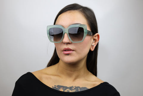 Woman wearing these luxury designer SEE sunglasses