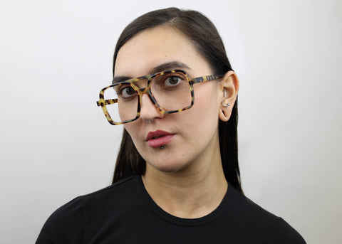 Woman wearing these SEE Eyeglasses