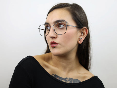 Woman wearing these SEE Eyeglasses