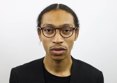 man wearing these luxury designer SEE Eyeglasses