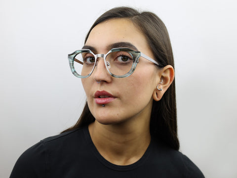 Woman wearing these luxury designer SEE Eyeglasses