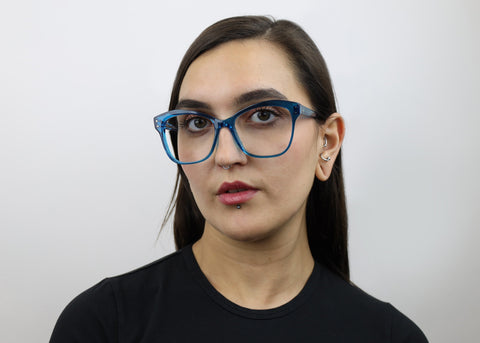 Woman wearing these SEE Eyeglasses