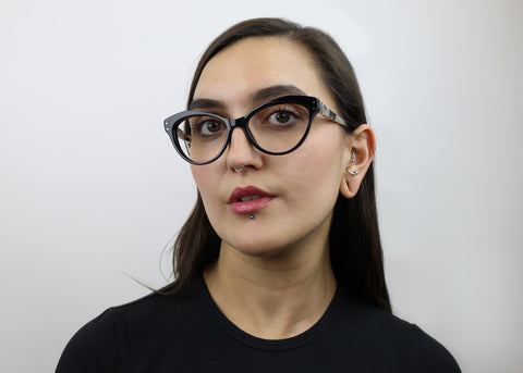 Woman wearing these luxury designer SEE Eyeglasses